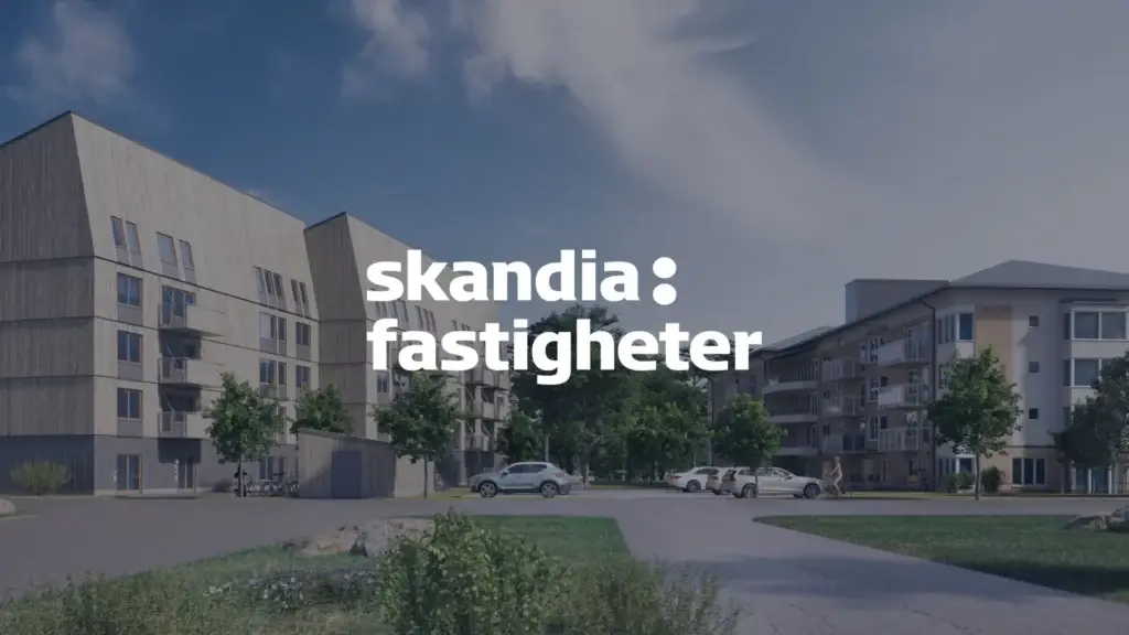 Skanda fastigheter logotyp med hus i bakgrunden